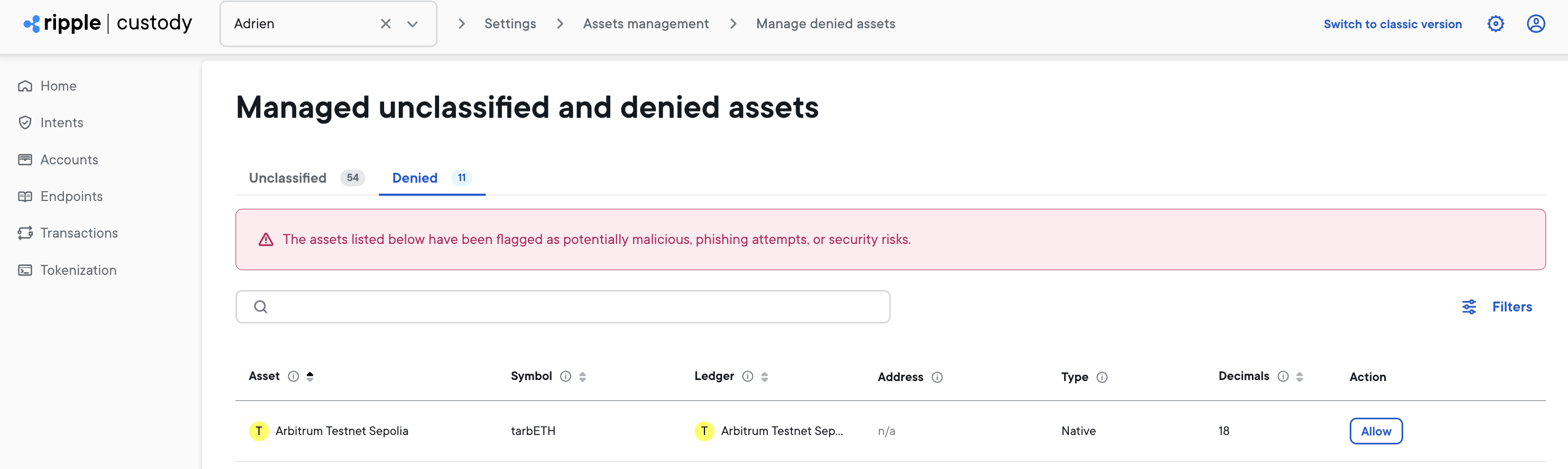 Denylisted tokens view showing blocked tokens with warning banner