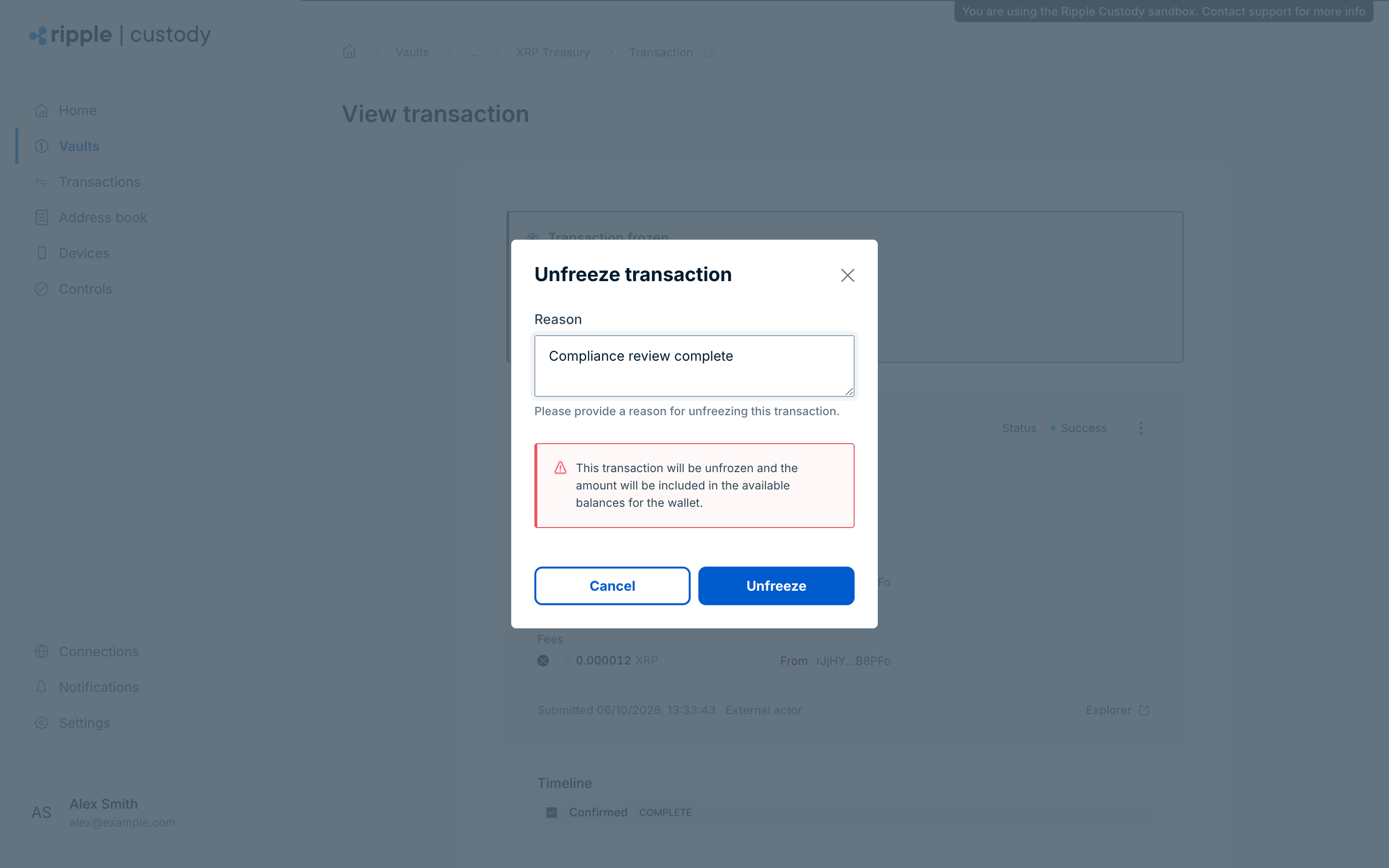The Unfreeze transaction dialog, with a reason entered in the Reason field